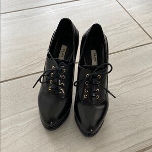 Prada Black Leather Flats with Gold Eyelets